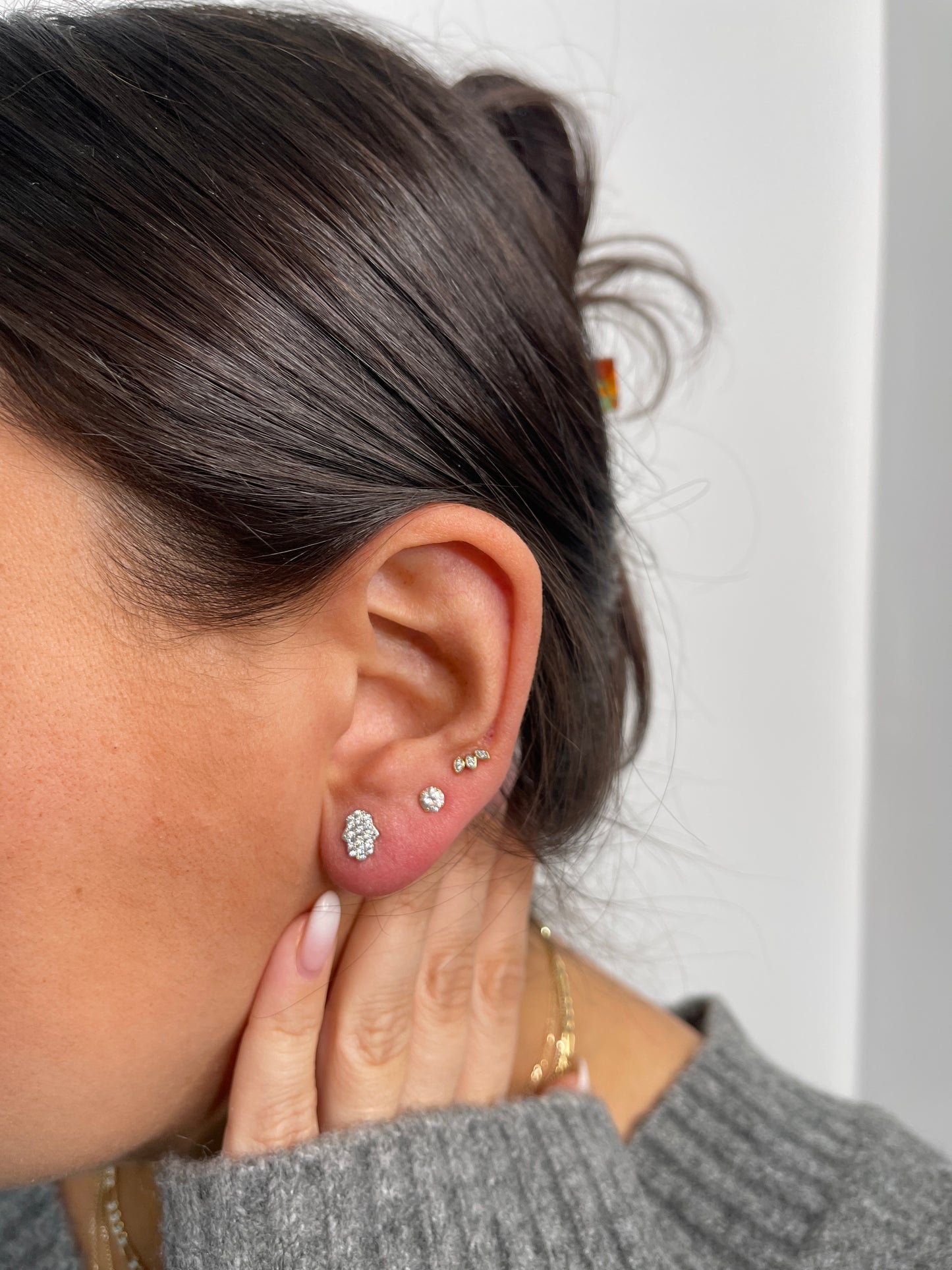 White gold pave hamsa studs