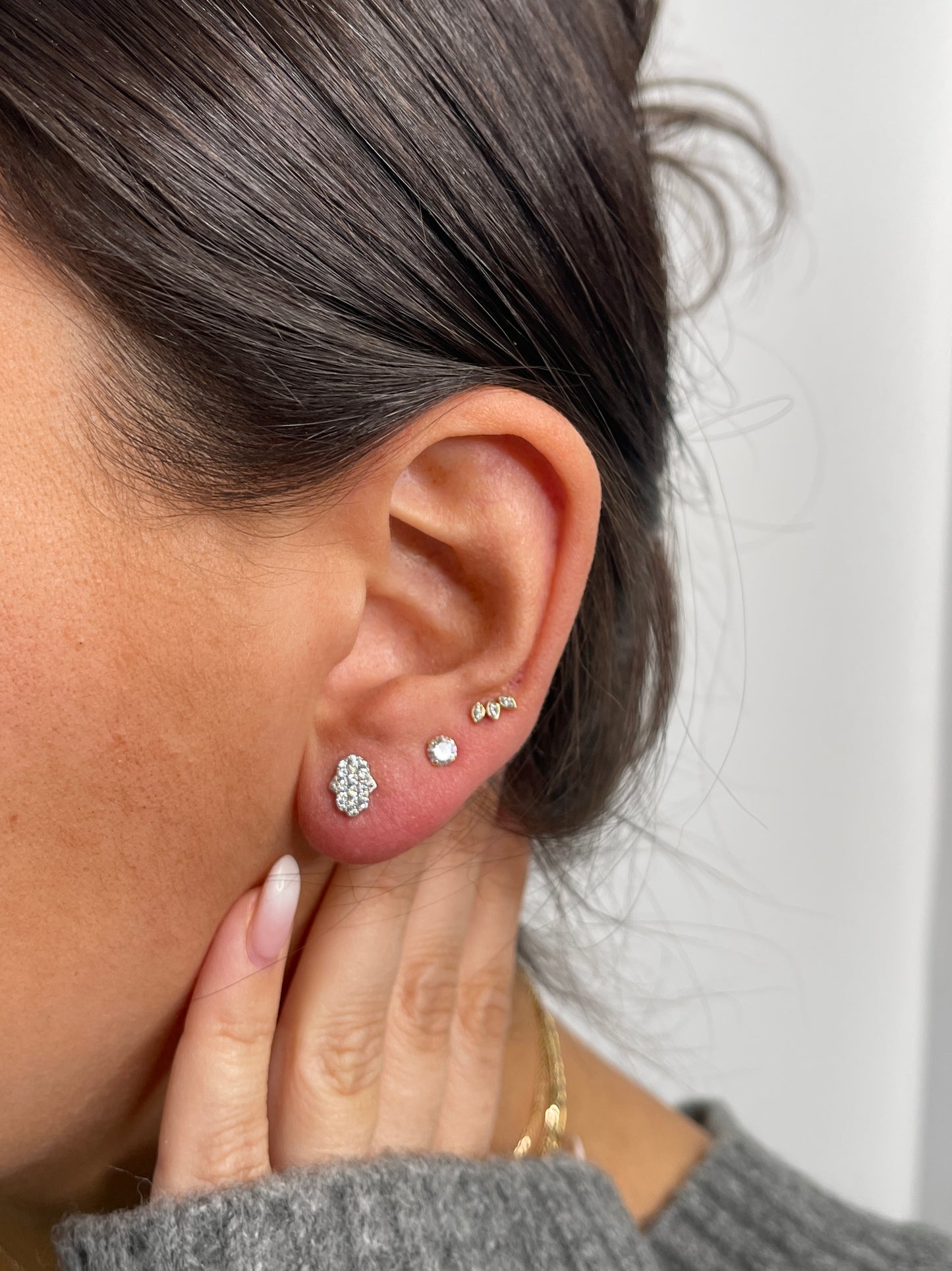 White gold pave hamsa studs
