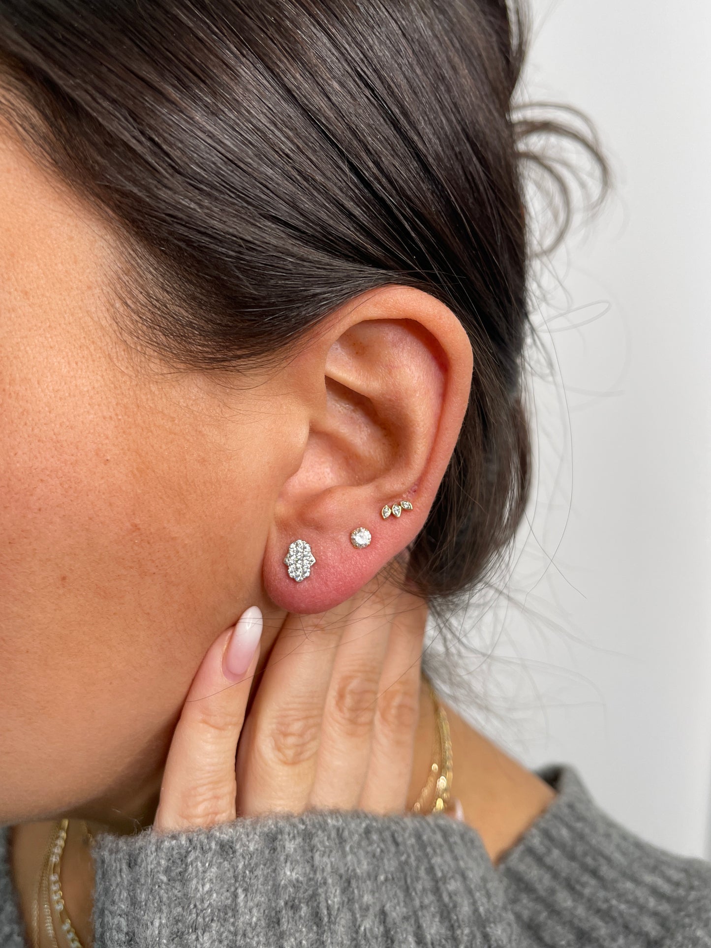 White gold pave hamsa studs